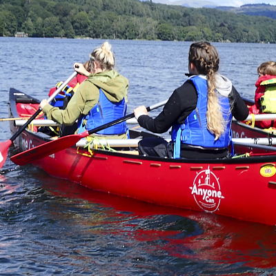 Canoing with the baots joined together on a sunny day