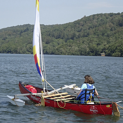 Wheelchair user in sailng canoe