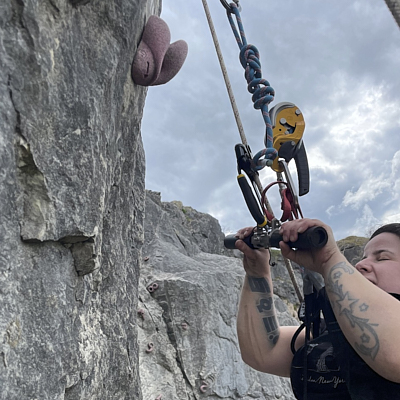 Person Climbing Multipitch in Mountains