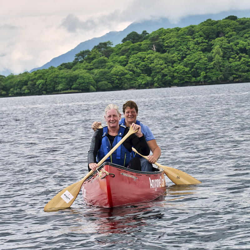 Canoe Sailng with full sails 