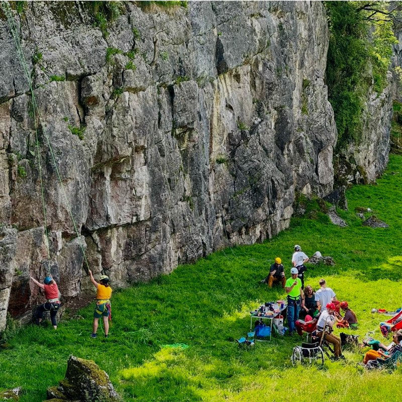 Far shot of whitches quarry showing people chilling underneath