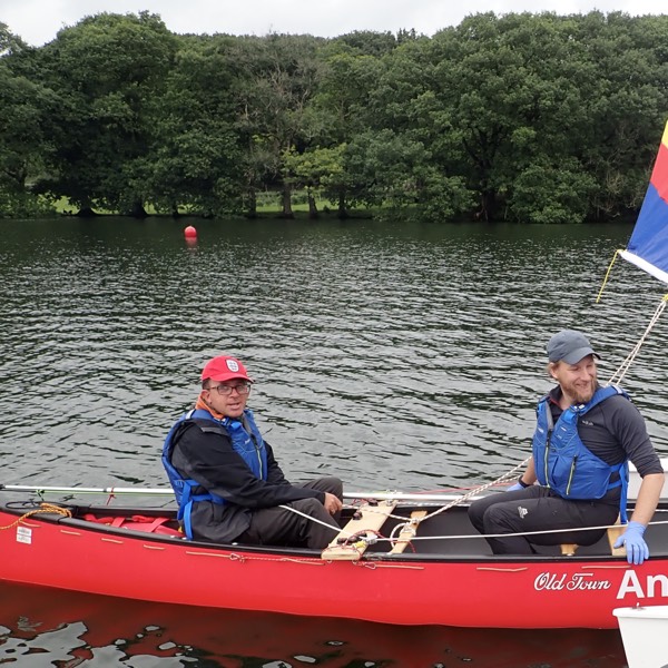 Wheelchair user in sailng canoe