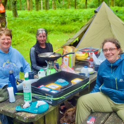 Two ladies on the canal in a canoe 