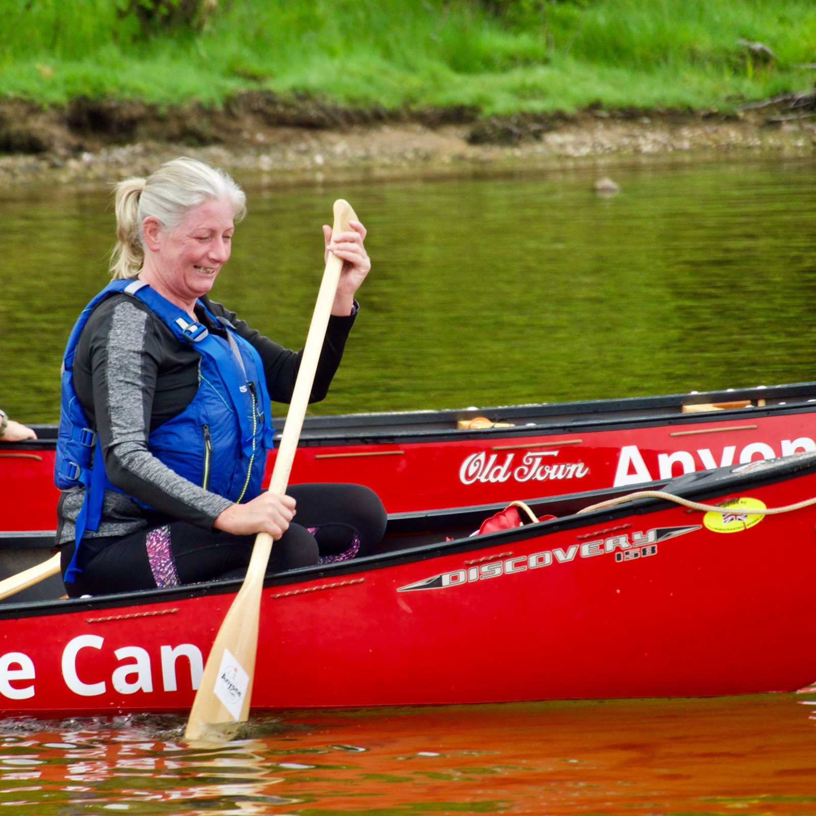 Canoe Sailng with full sails 