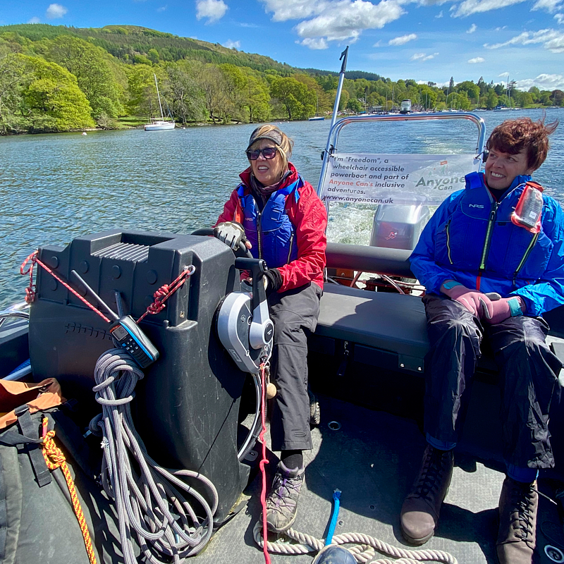 Post canoe sailng ride back in the big black powerboat