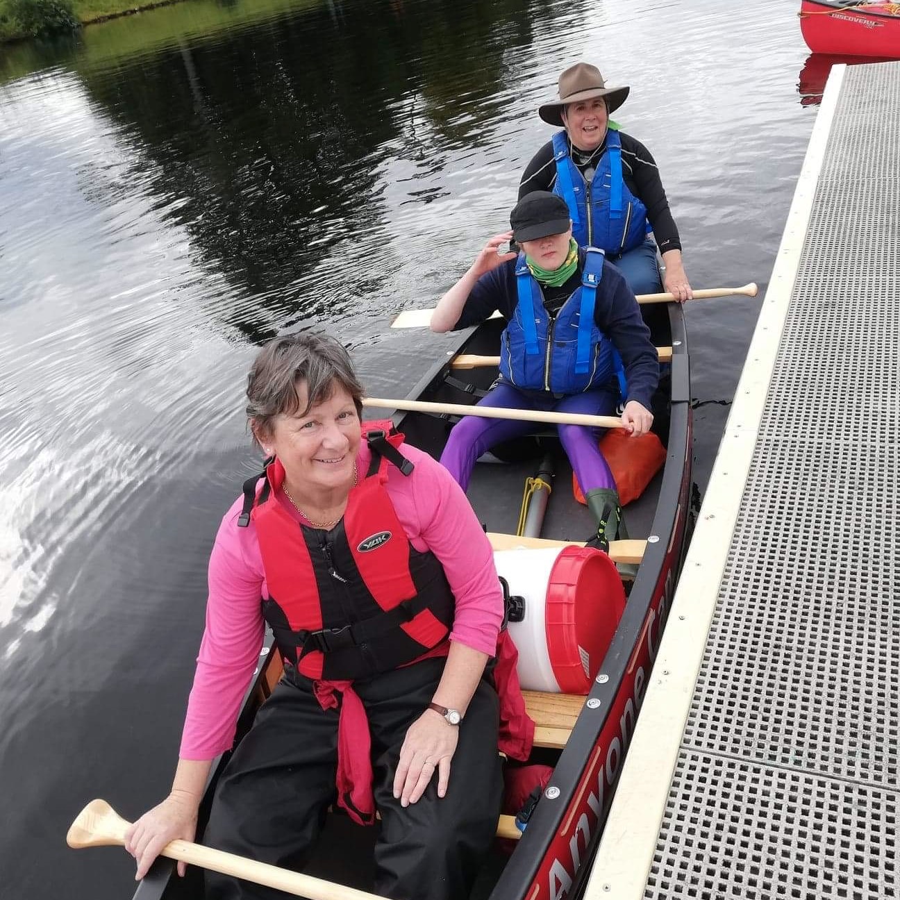 Two ladies on the canal in a canoe 